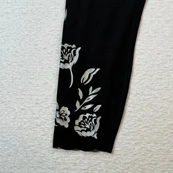 Athleta Elation Eyelet 7/8 Tight Leggings Black Floral Women's size medium - Picture 2 of 6